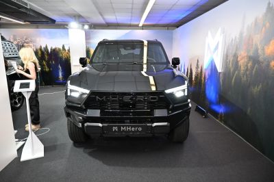 Front view of pickup truck showcasing grille and LED headlights