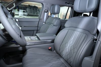 Premium leather seats with detailed stitching and ergonomic design