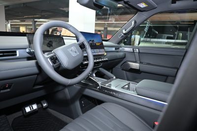 Digital dashboard and large central touchscreen in a premium interior