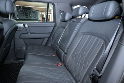 Luxury leather rear seats with detailed stitching and spacious layout