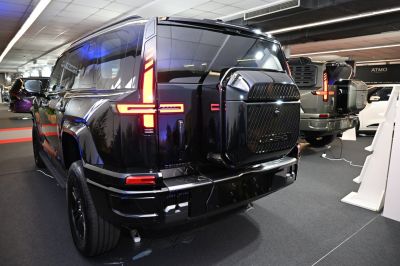 Rear of SUV with distinctive LED tail lights and spare tire mount
