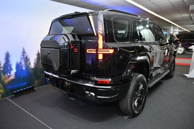 Modern rear design with vertical LED tail lights and spare tire mount