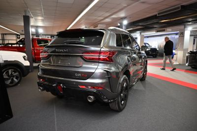 Rear view of SUV with modern taillights and dual exhaust