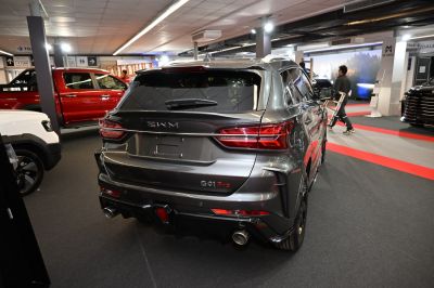 Rear view of SUV with dual exhaust and sleek taillights