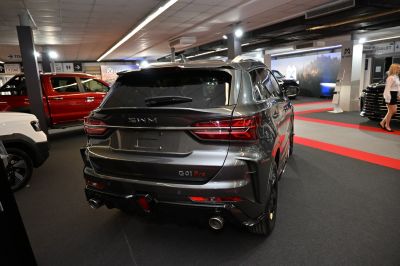 Rear view of SUV with dual exhaust and modern taillights