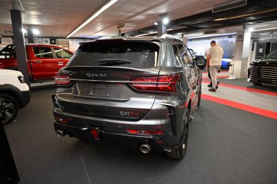 Rear SUV view with sporty dual exhausts and modern taillights