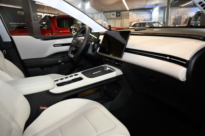 Modern car interior with large touchscreen and sleek dashboard