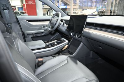 Modern car interior with digital dashboard and premium seats