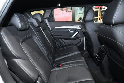 Black leather rear seats with stitching and spacious interior
