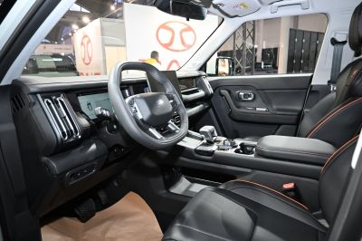Modern dashboard and steering wheel with digital displays and ergonomic controls
