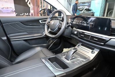 Digital touchscreen dashboard and ergonomic steering wheel in modern interior