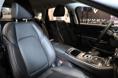 Premium leather front seats and sleek center console with modern design