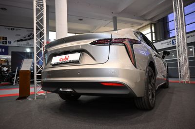 Modern rear end with sleek taillights and smooth bumper