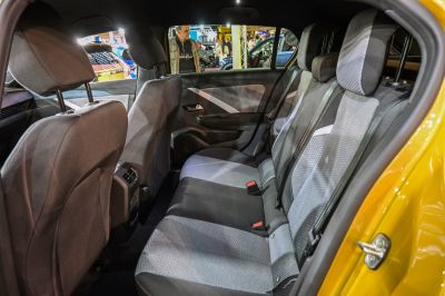 Rear seating interior with fabric upholstery and modern design accents