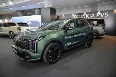 Front and side view with vertical LED headlights and black alloy wheels