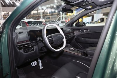 Modern digital dual-screen dashboard and uniquely designed steering wheel