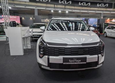 Front grille and headlights of a modern SUV with updated brand emblem