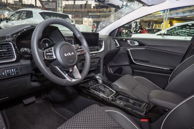 Digital dashboard and touchscreen center console with gear shifter and steering wheel controls