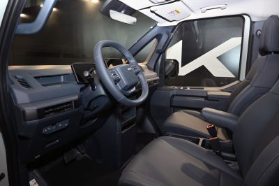 Modern steering wheel and digital dashboard in passenger vehicle interior