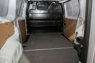 Spacious cargo interior with flat floor and reinforced side panels