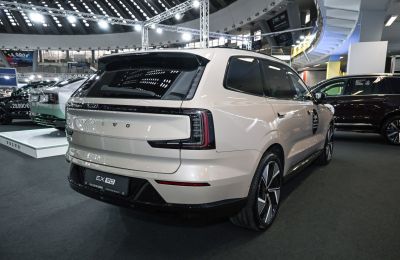 Rear and side exterior view with modern taillights, sporty wheels