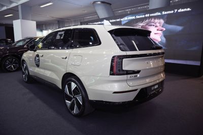 Rear side view of electric SUV with large alloy wheels and sleek taillights