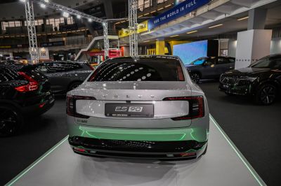 Rear view of a luxury sedan with LED tail lights and modern design
