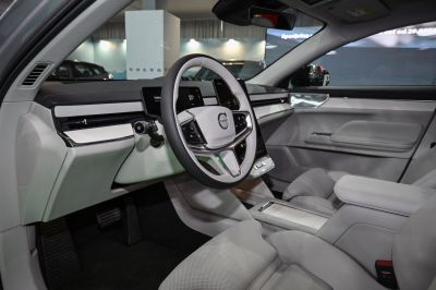 Digital instrument cluster and multifunction steering wheel in car interior