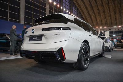 Rear view with sleek tail lights and black alloy wheels
