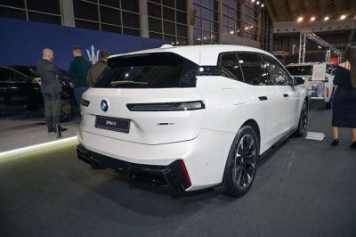 Rear view of sleek electric SUV with modern taillights and aerodynamic design