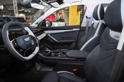 Modern steering wheel, dashboard, and comfortable front seats