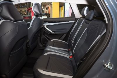 Modern rear seat interior with detailed upholstery and spacious seating