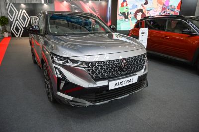 Front view with distinctive grille and sleek angular headlights