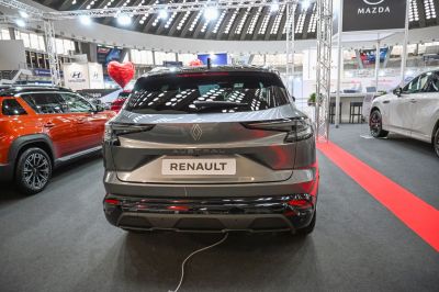 Rear view of a modern SUV with sleek taillights and blacked-out lower bumper