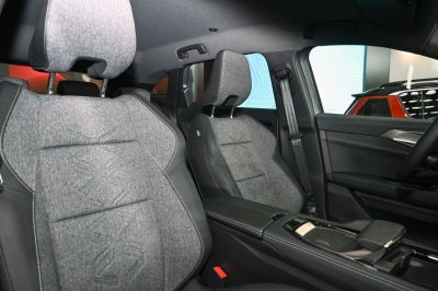 Fabric and leather seats with detailed stitching and a modern central console