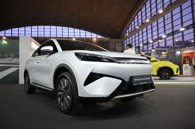 Front view with sharp headlights and aerodynamic design