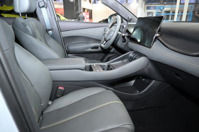 Modern dashboard with large touchscreen and ergonomic center console.