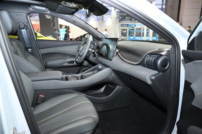Modern electric SUV interior with digital dashboard and touchscreen display