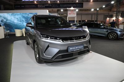Front view of modern SUV with sleek headlights and aerodynamic design