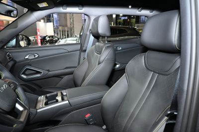 Premium leather front seats with modern door panel design
