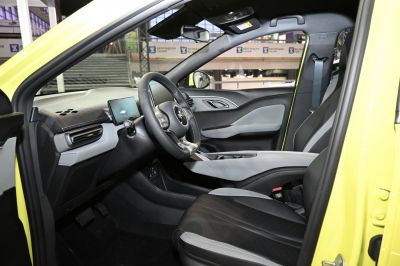 Modern electric car interior with digital dashboard and touchscreen center display