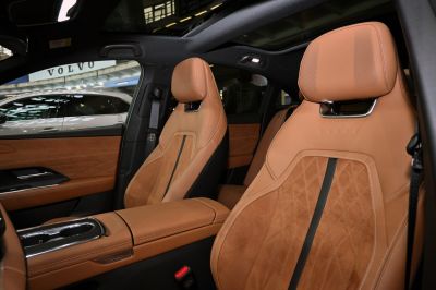 Tan leather sports seats with panoramic roof