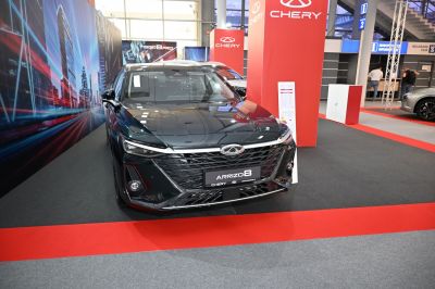 Sleek 2022 sedan front with LED headlights and modern grille