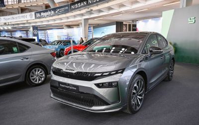 Front view with sleek LED headlights and sporty alloy wheels