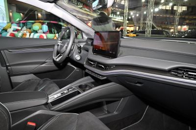 Modern car dashboard with digital touchscreen and center console