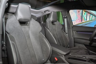 Sport seats with leather and suede upholstery in modern coupe interior