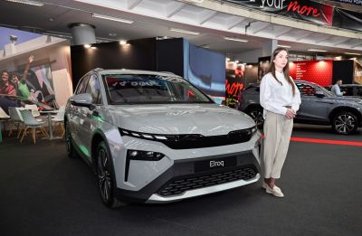 Front view of sleek electric crossover SUV with LED lighting