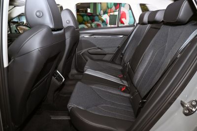 Rear seats with fabric and leather upholstery, rear air vents, modern door panel