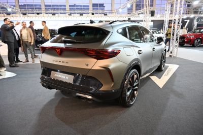 Rear view of sporty SUV with LED taillights and quad exhaust pipes