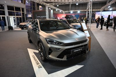 Matte finish SUV with sharp headlights and aggressive front design